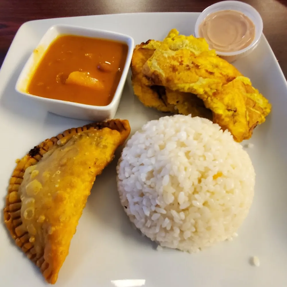 Arroz Con Habichuelas Empanada and Tostones